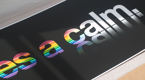 Close up of a typographic rainbow print