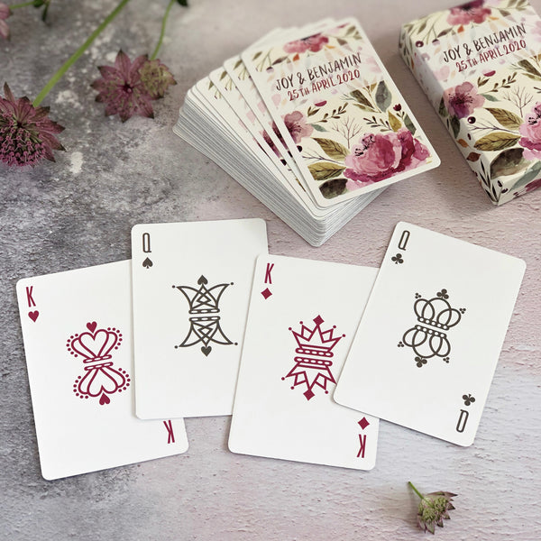 Playing card wedding favours for a floral theme wedding
