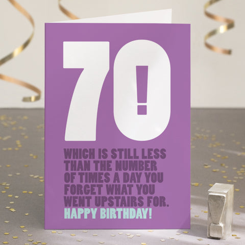 A funny 70th birthday card with the text '70, which is still less than the number of times a day you forget what you went upstairs for'.
