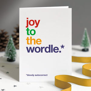 Funny christmas card autocorrected to 'joy to the wordle'.