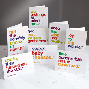 A pack of 8 autocorrected funny christmas cards.