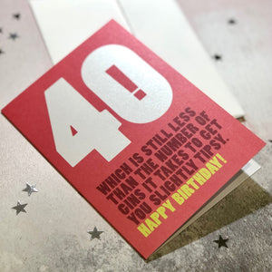 A funny 40th birthday card with the text '40, which is still less than the number of gins it takes to get you slightly tipsy'.