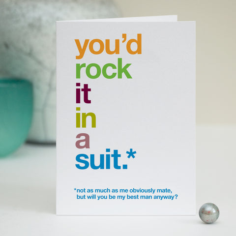 A greetings card with the text 'you'd rock it in a suit, not as much as me obviously mate, but will you be my best man anyway?'.