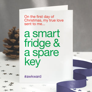 A funny christmas card with the twelve days of christmas lyric altered to 'a smart fridge and a spare key'.
