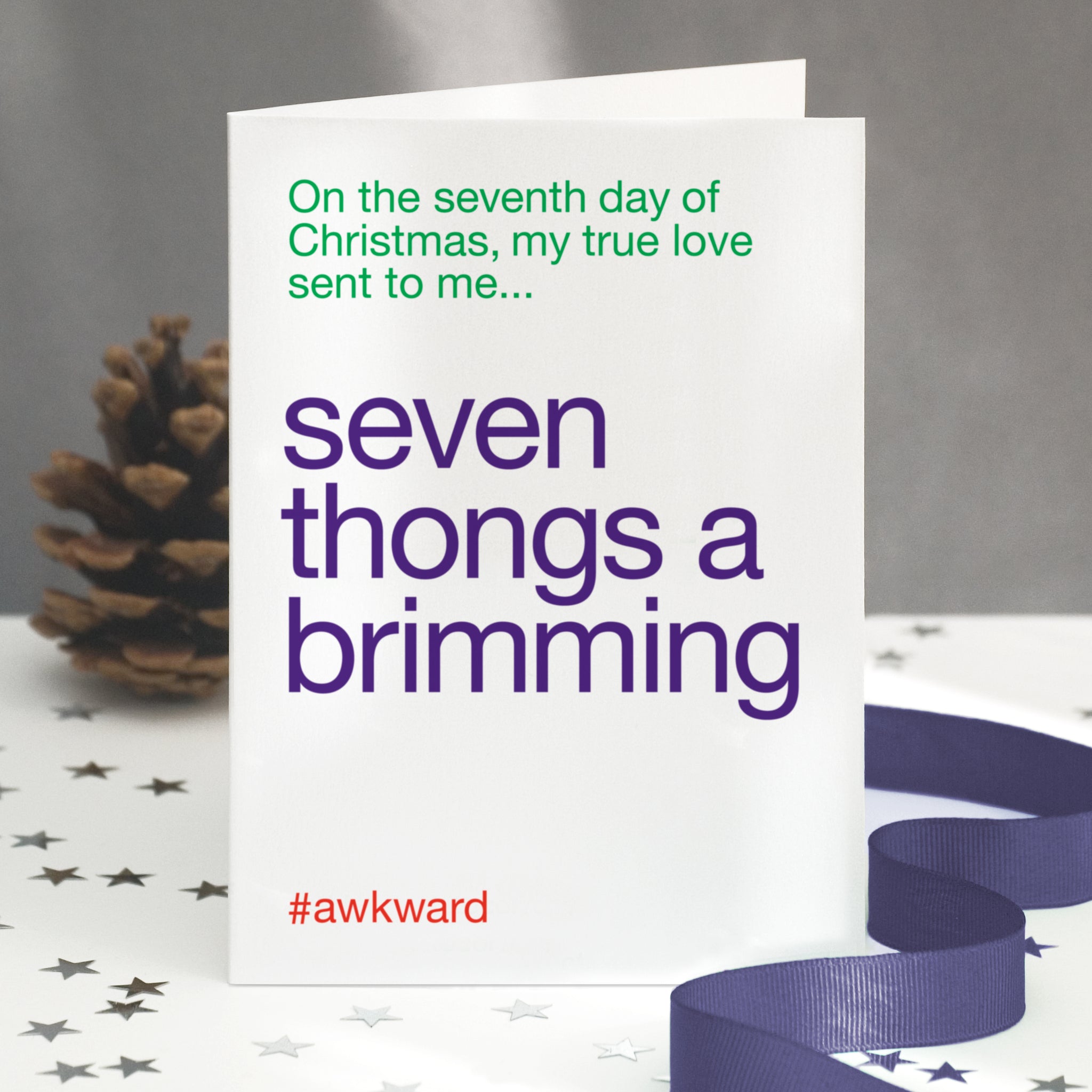 A funny christmas card with the twelve days of christmas lyric altered to 'seven thongs a brimming'.