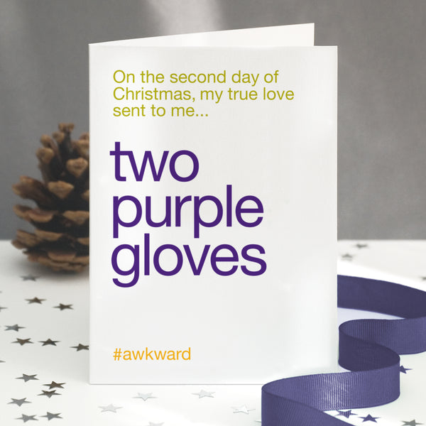 A funny christmas card with the twelve days of christmas lyric altered to two purple gloves