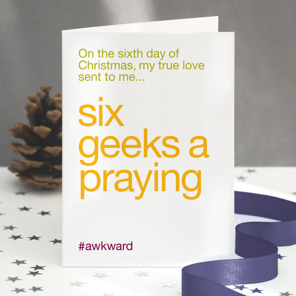 A funny christmas card with the twelve days of christmas lyric altered to six geeks a praying