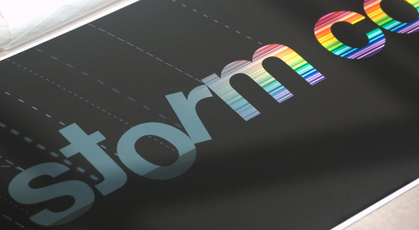 Close up of typography illustrating a storm turning into a rainbow