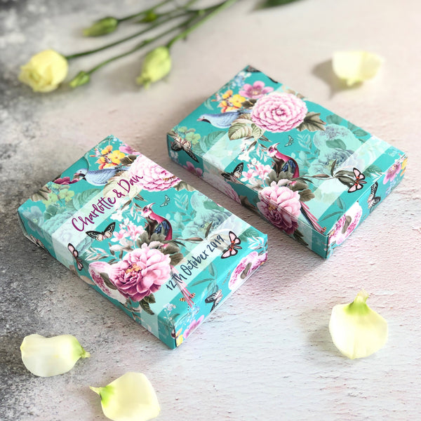 Personalised playing card boxes with a botanical design