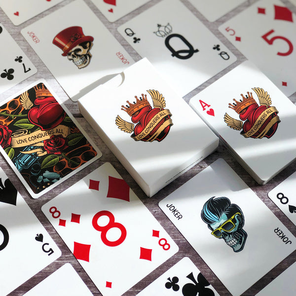 A deck of designer poker cards laid out to show a unique pip system