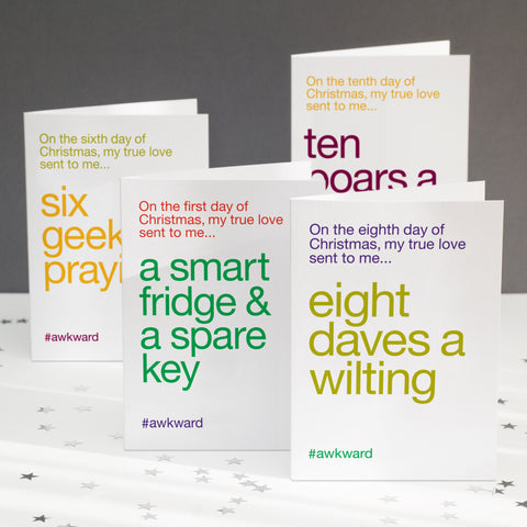 A pack of four greetings cards showing nonsensical lyrics to the twelve days of christmas.