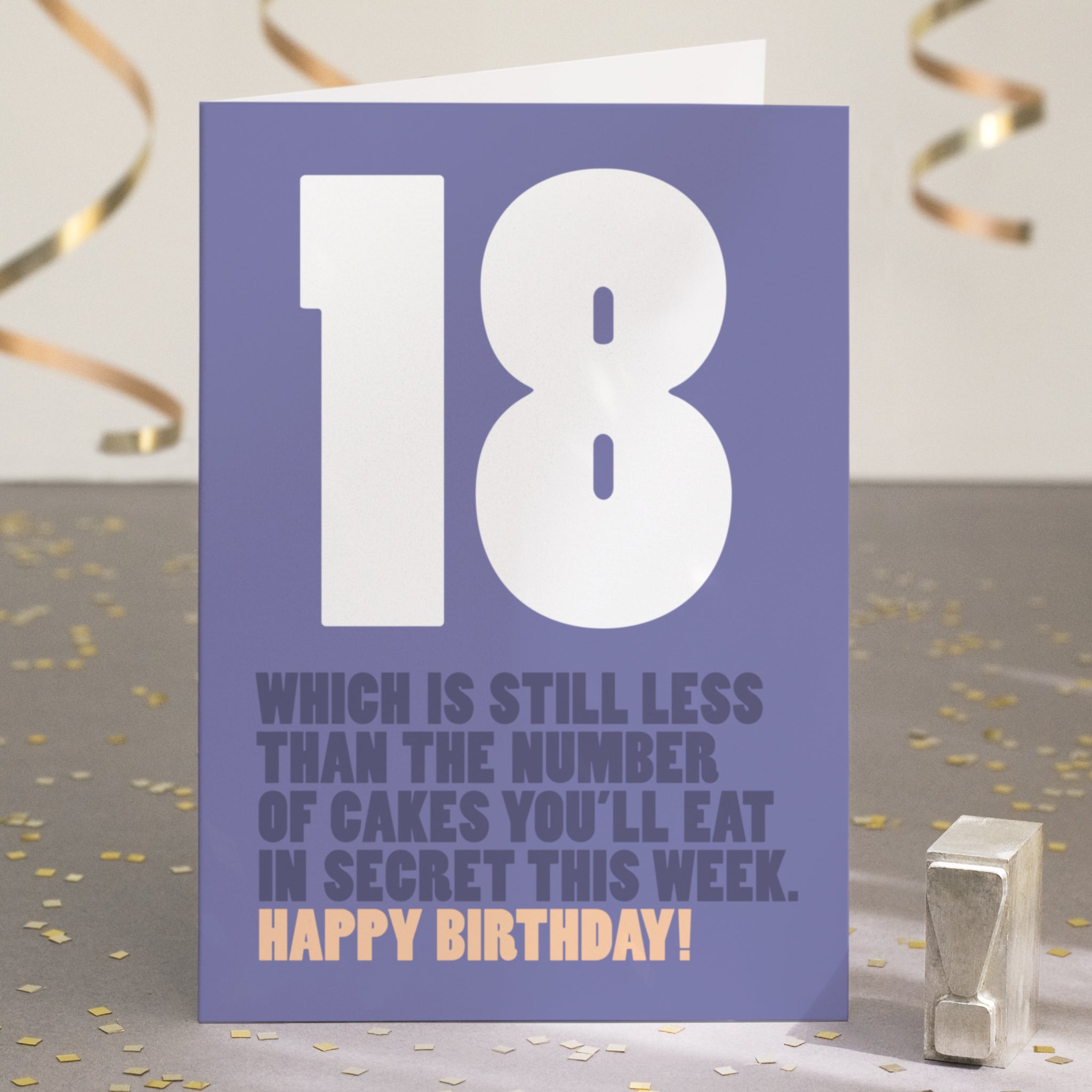 A funny 18th birthday card with the text '18, which is still less than the number of cakes you’ll eat in secret this week'.