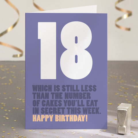 A funny 18th birthday card with the text '18, which is still less than the number of cakes you’ll eat in secret this week'.