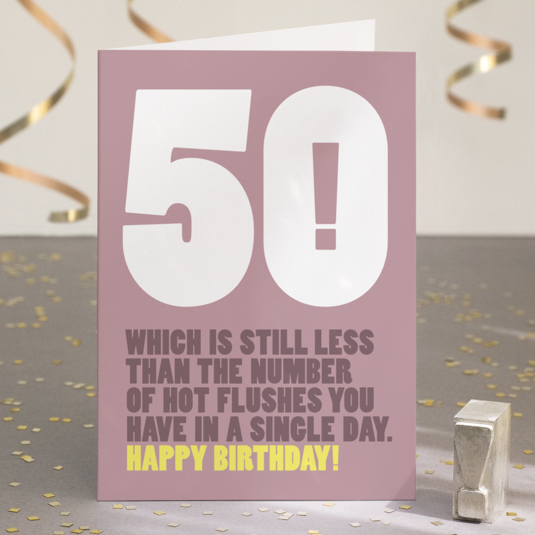 A funny 50th birthday card with the text '50, which is still less than the number of hot flushes you have in a single day'.