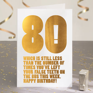 A funny 80th birthday card with the text '80, which is still less than the number of times you’ve left your false teeth on the bus this week'.