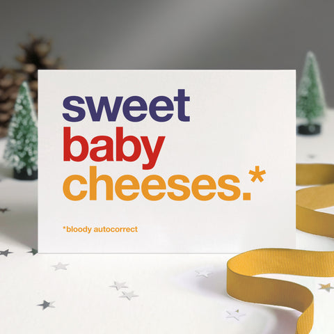 Funny christmas card autocorrected to 'sweet baby cheeses'.