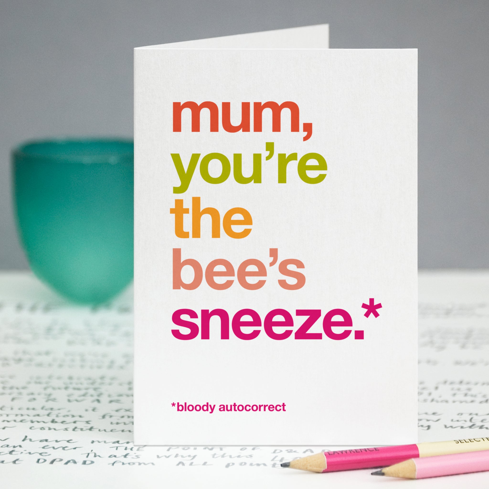 A greetings card with the text 'mum, you're the bee's sneeze, bloody autocorrect'.
