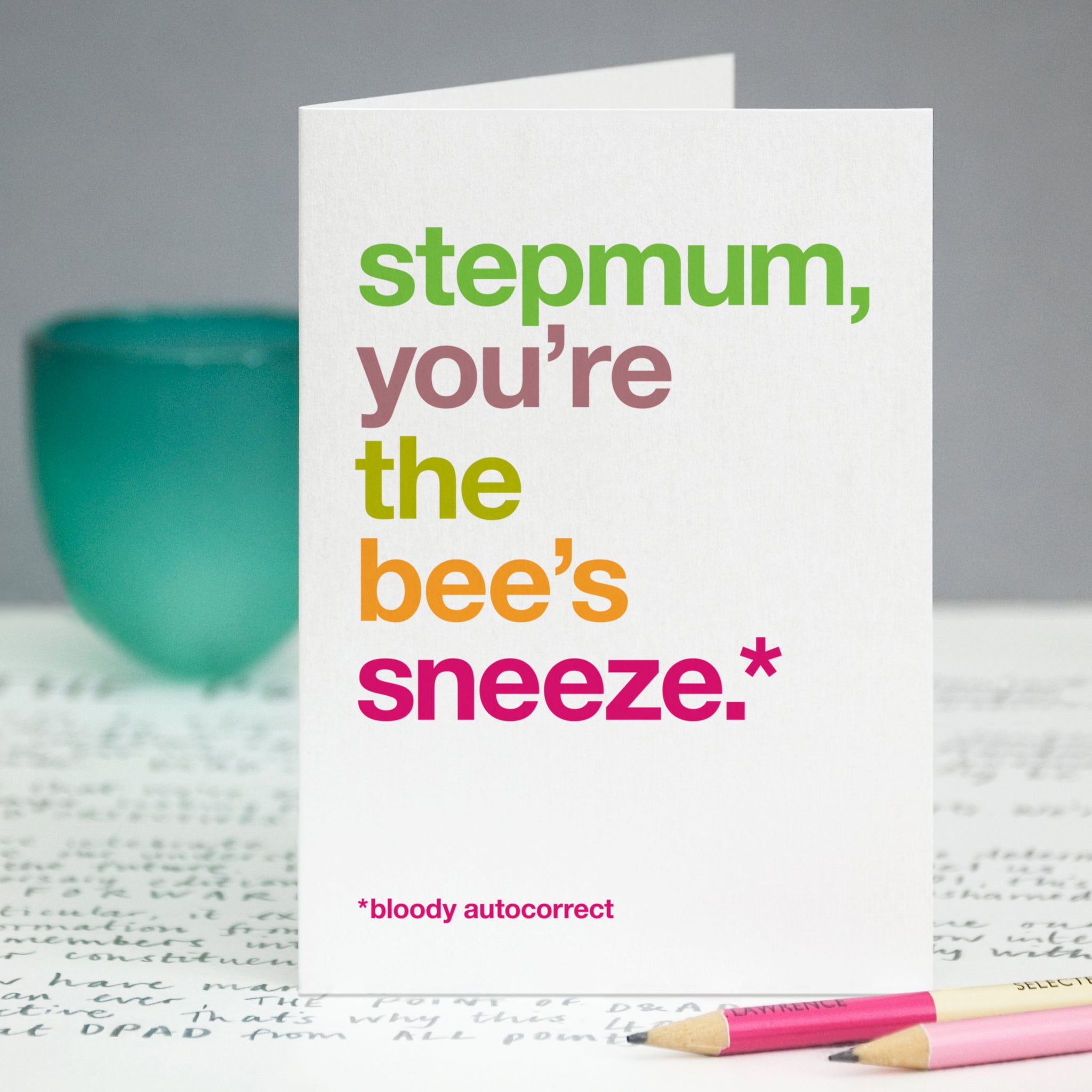 A greetings card with the text 'stepmum, you're the bee's sneeze, bloody autocorrect'.
