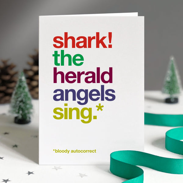 Funny christmas card autocorrected to shark the herald angels sing