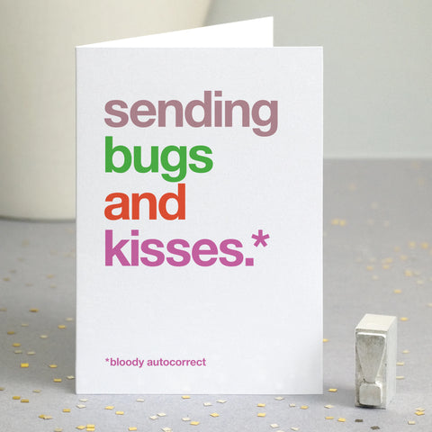 Funny card autocorrected to 'sending bugs and kisses'.