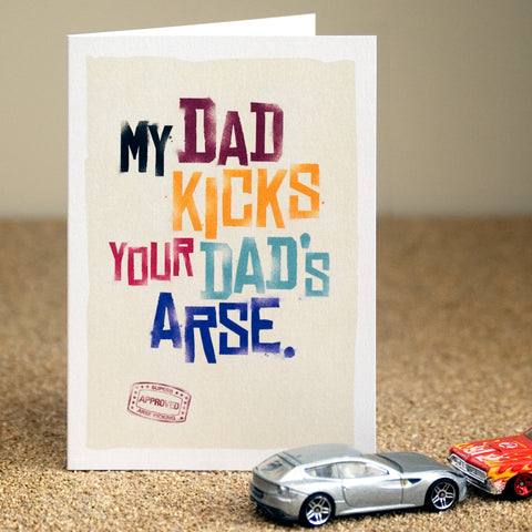A funny father's day card saying 'my dad kicks your dad's arse'.
