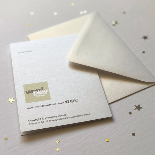 A luxury greetings card and envelope showing a beautiful pearlescent finish.